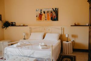 Llit o llits en una habitació de Piazza Argento