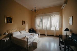 Llit o llits en una habitació de Piazza Argento