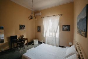 Llit o llits en una habitació de Piazza Argento