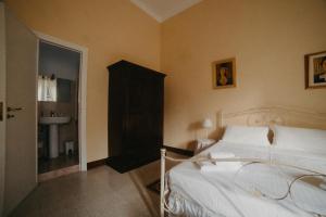 Llit o llits en una habitació de Piazza Argento