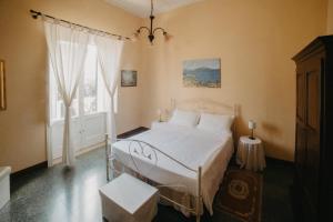 Llit o llits en una habitació de Piazza Argento