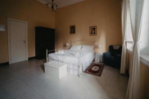 Llit o llits en una habitació de Piazza Argento