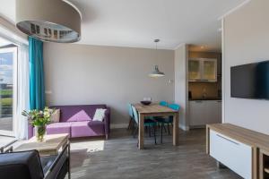 TV a/nebo společenská místnost v ubytování Vakantiewoning - Noordweg 56a Oostkapelle Comfort 4 personen