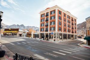 an empty city street with a large brick building at Belvada Hotel in Tonopah