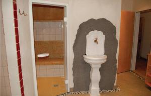 a bathroom with a toilet in the corner at Amazing Apartment In Kirchberg With 2 Bedrooms And Wifi in Kirchberg in Tirol