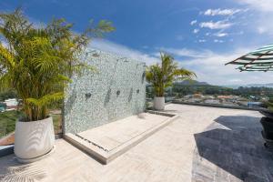 Fotografie z fotogalerie ubytování Calypso Garden by Villacarte v destinaci Rawai pláž