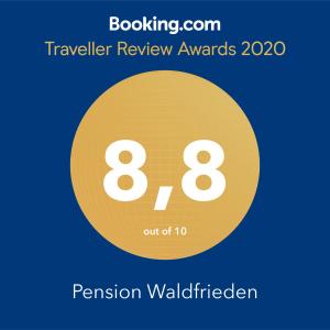 a yellow circle with the number eight and the text travelling review awards at Pension Waldfrieden in Thale