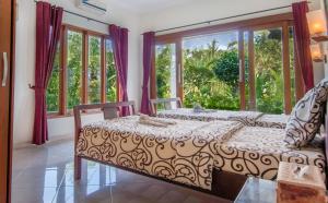 Una cama o camas en una habitación de The North Cape Beach Villas