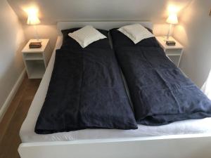Eichenhof I tesisinde bir odada yatak veya yataklar