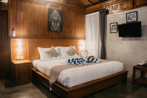 Postel nebo postele na pokoji v ubytování Japa Guesthouse