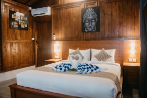 Postel nebo postele na pokoji v ubytování Japa Guesthouse