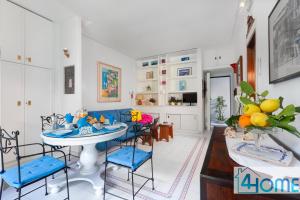 a kitchen and living room with a table and chairs at Estate4home - RELAXING POSITANO in Positano