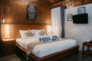 Postel nebo postele na pokoji v ubytování Japa Guesthouse