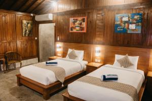 Postel nebo postele na pokoji v ubytování Japa Guesthouse