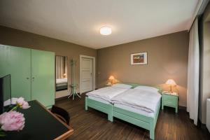 Posteľ alebo postele v izbe v ubytovaní Hotel Tre Cime Sesto - Sexten