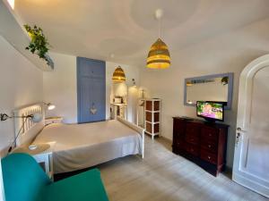 Una cama o camas en una habitación de Apt. Portolano By SolturElba