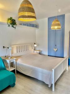 Una cama o camas en una habitación de Apt. Portolano By SolturElba