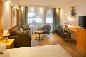 TV a/nebo společenská místnost v ubytování Hotel Menning ***S