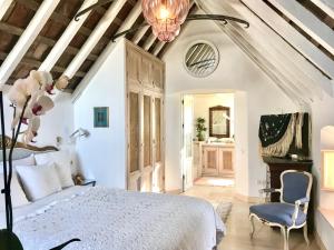 Posteľ alebo postele v izbe v ubytovaní CASA PUERTA AZUL Absolutely the Best of Vejer! Casas Vejer Debra