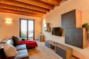 Telewizja i/lub zestaw kina domowego w obiekcie Villa Sinfonia