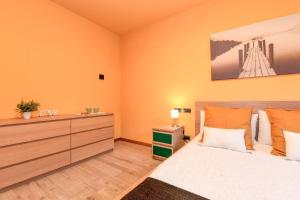 Łóżko lub łóżka w pokoju w obiekcie Villa Sinfonia