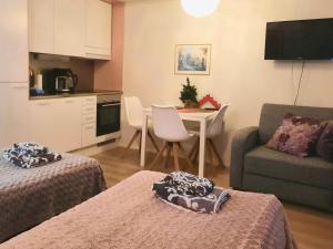 Kuchyň nebo kuchyňský kout v ubytování Patria apartments + 6 fotografií