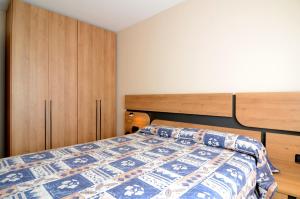 Ein Bett oder Betten in einem Zimmer der Unterkunft San Enrique B 2-2