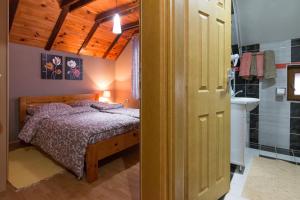 Postel nebo postele na pokoji v ubytování Apartments Andrić