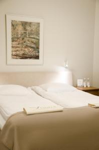 Letto o letti in una camera di Hotel Vanilla