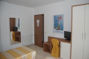 TV a/nebo společenská místnost v ubytování Hotel Derna