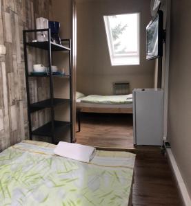 Postel nebo postele na pokoji v ubytování Petra Vendégház