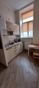 Η κουζίνα ή μικρή κουζίνα στο Apartments in Lemberg