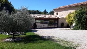 Aed väljaspool majutusasutust Chambres d'hôtes Le Vignoble