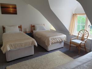 A bed or beds in a room at The Wycliffe