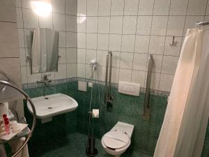 Kúpeľňa v ubytovaní Matejko Hotel