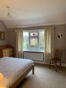 Postel nebo postele na pokoji v ubytování Church Farm, Legbourne Louth