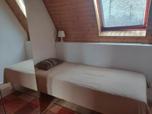 Posteľ alebo postele v izbe v ubytovaní Attila-Apartman Budaörs