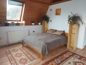 Posteľ alebo postele v izbe v ubytovaní Attila-Apartman Budaörs
