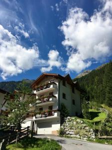 a building with balconies on the side of it at Schönes Studio im ruhigen Kaunertal in Kaunertal