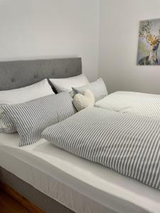 מיטה או מיטות בחדר ב-INN Apart Tirol