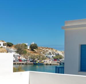 a view of a harbor from a building at Psathi Blue Beta in Kimolos