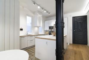 Kuchyň nebo kuchyňský kout v ubytování Apartamento Barcelo en Madrid + 14 fotografií