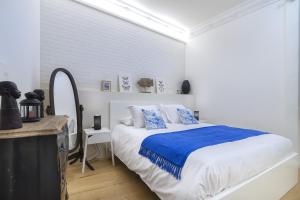 Postel nebo postele na pokoji v ubytování Apartamento Barcelo en Madrid