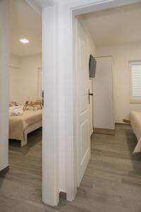 Postel nebo postele na pokoji v ubytování Holiday Home Intrade