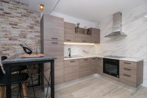 Kuchyň nebo kuchyňský kout v ubytování Holiday Home Intrade