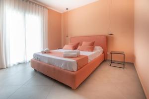 Posteľ alebo postele v izbe v ubytovaní Casa Angelina