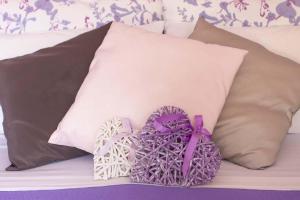 Postel nebo postele na pokoji v ubytování B&B La Corte della Nonna