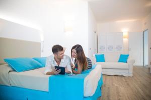 Postel nebo postele na pokoji v ubytování Lu' Hotel Maladroxia