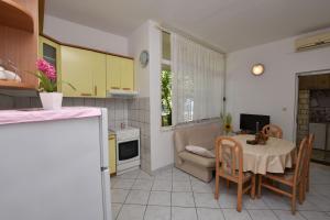 Kuchyň nebo kuchyňský kout v ubytování Apartments Vinko