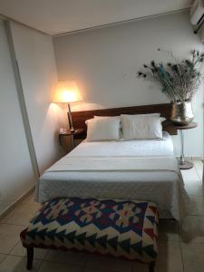 Ліжко або ліжка в номері Corumbá Plaza Hotel